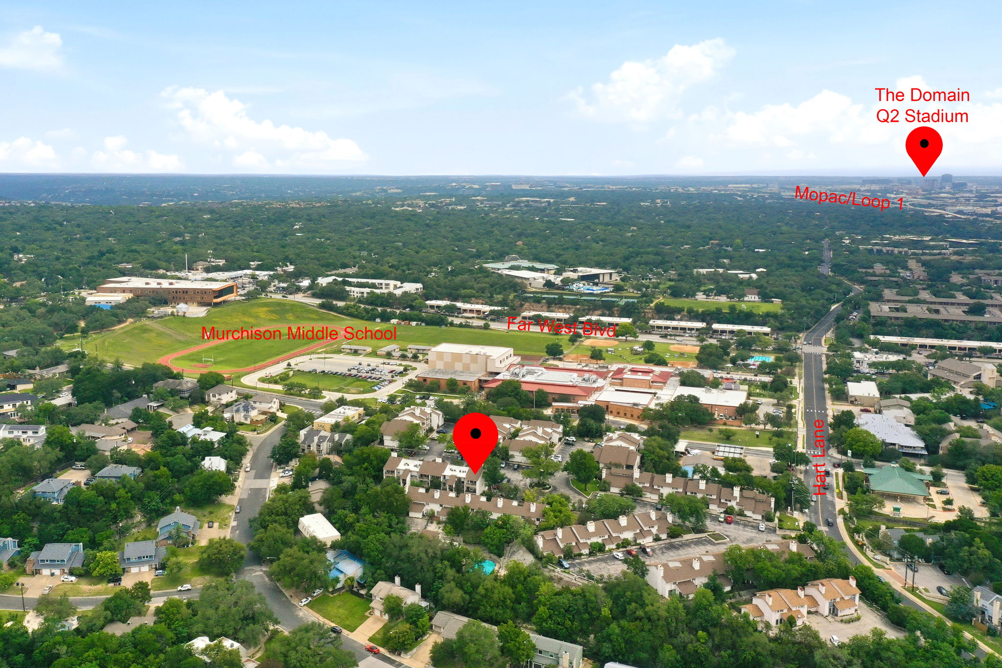 6910 Hart Lane, Unit 912 Austin, TX 78731 - Photo 35 of 36 Aerial perspective of the surrounding area featuring abundant green spaces