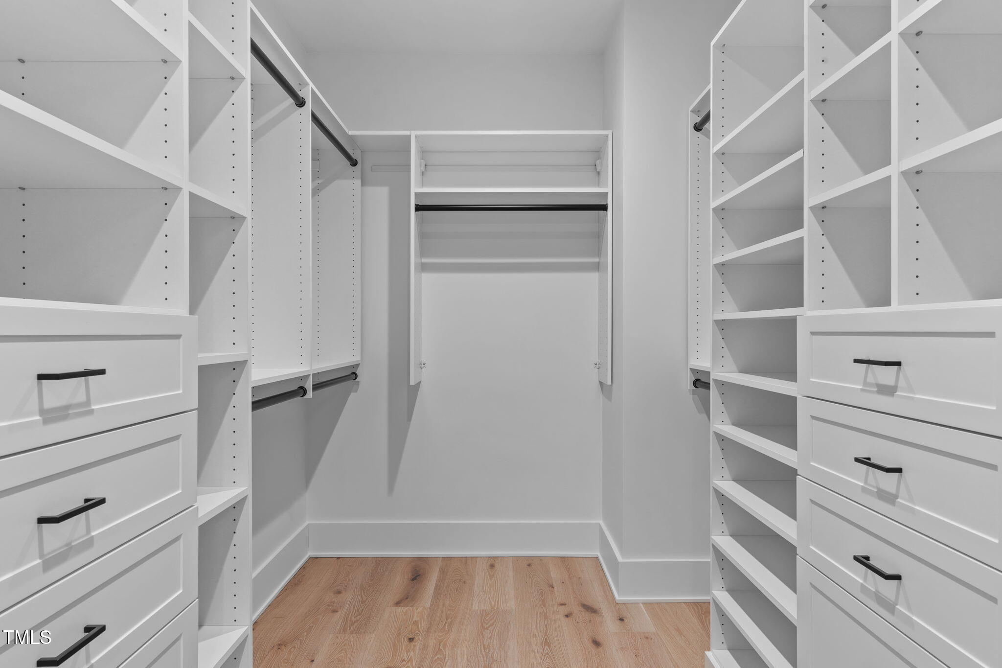 1406 Lyon Street, Unit 101 Raleigh, NC 27608 - Photo 32 of 62 a view of walk in closet