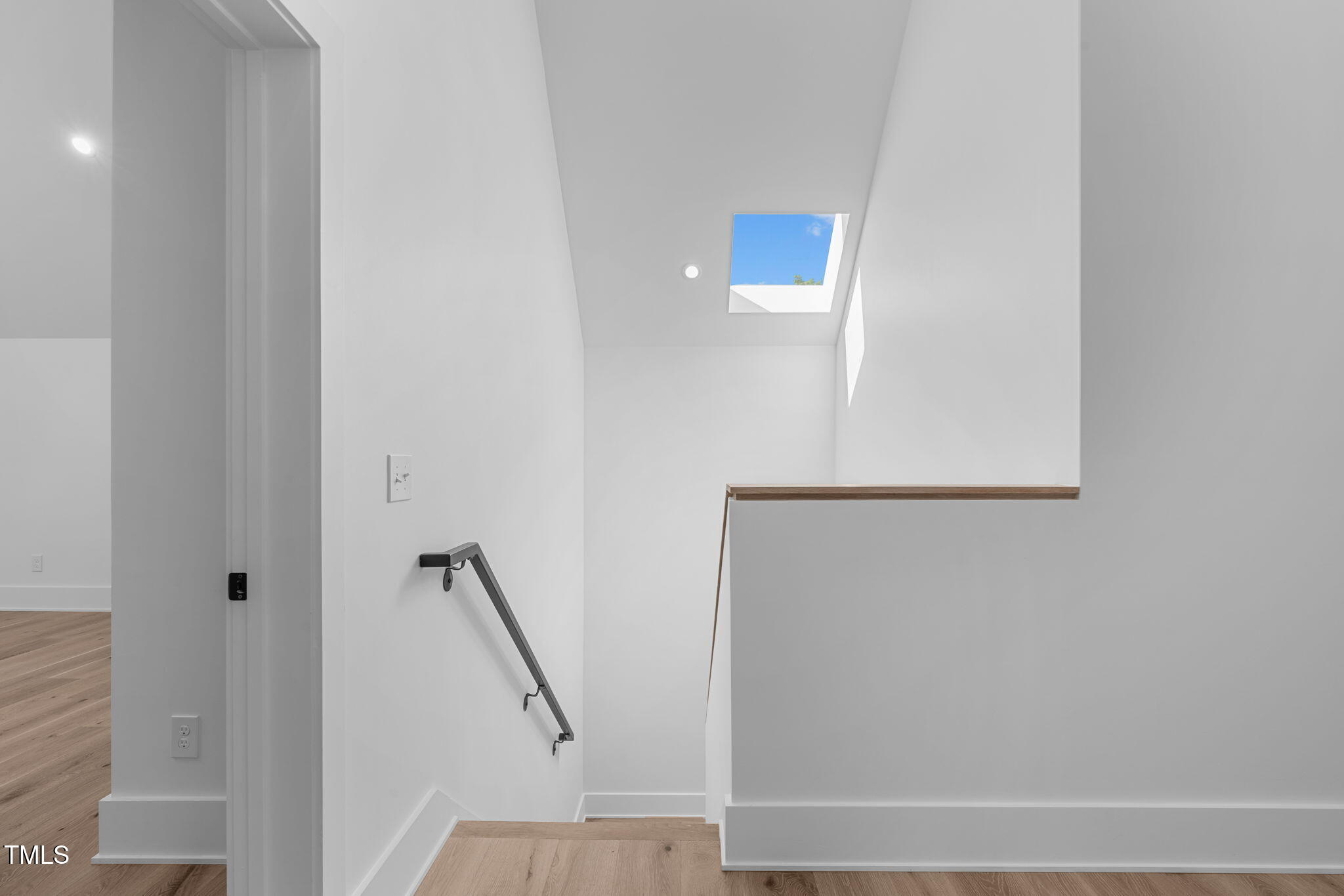 1406 Lyon Street, Unit 101 Raleigh, NC 27608 - Photo 46 of 62 a view of staircase with white walls