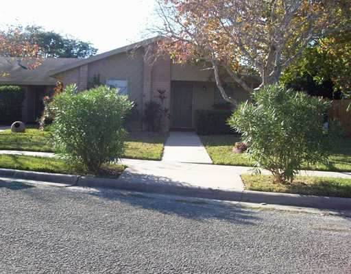 a view of backyard and tree
