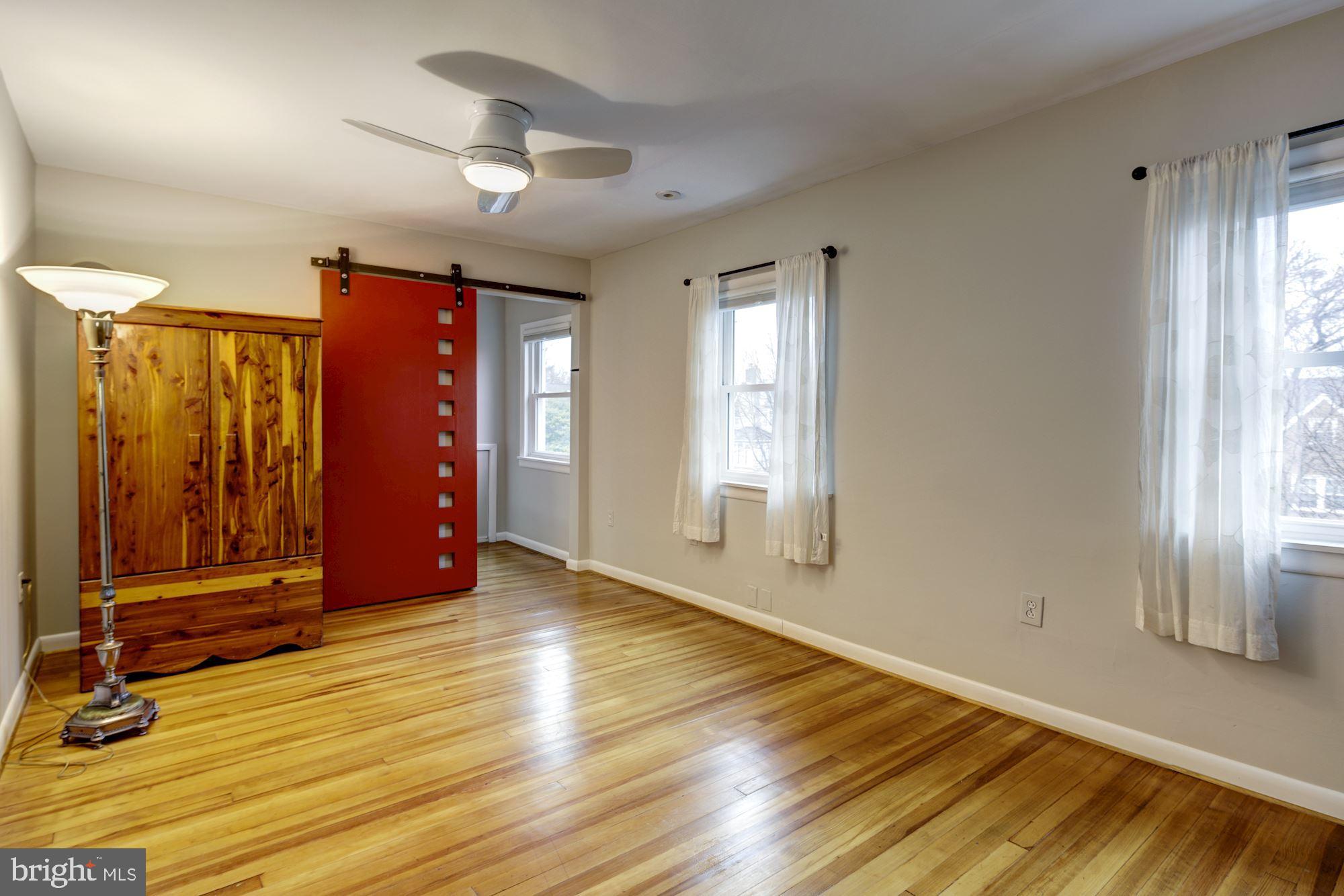 637 Anneslie Road Baltimore, MD 21212 - Photo 22 of 58 Master bedroom: two windows. Front of house.