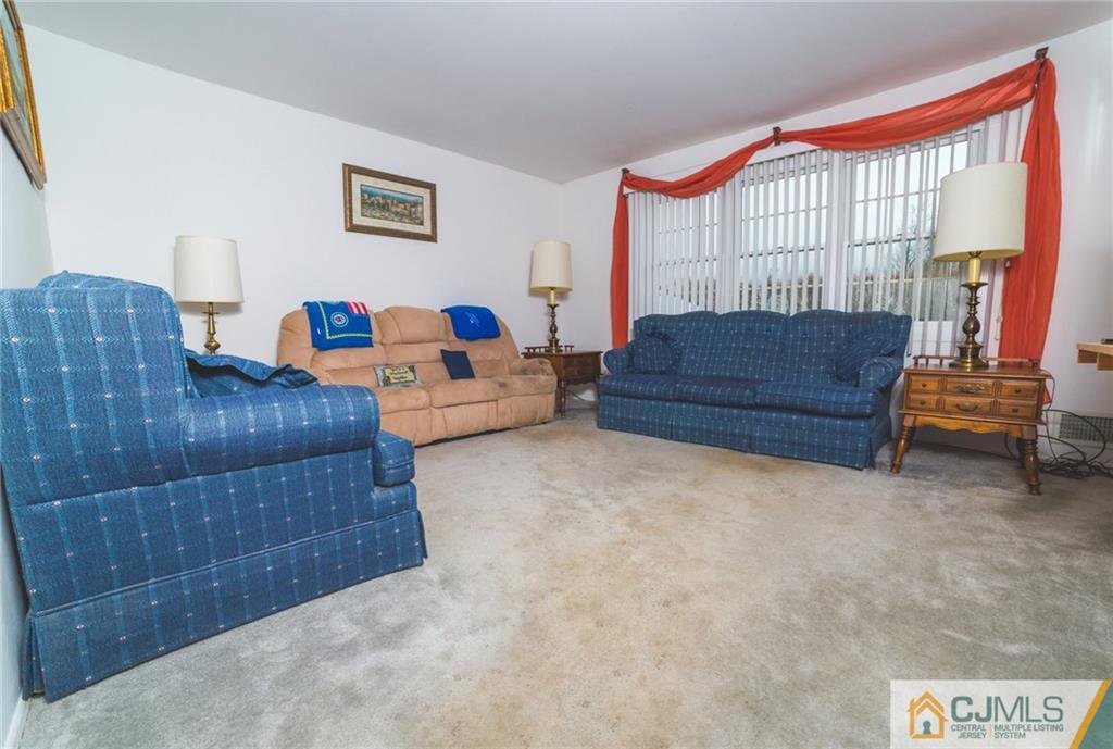 110 Princeton Road Old Bridge, NJ 08859 - Photo 11 of 19 a bedroom with furniture and a window