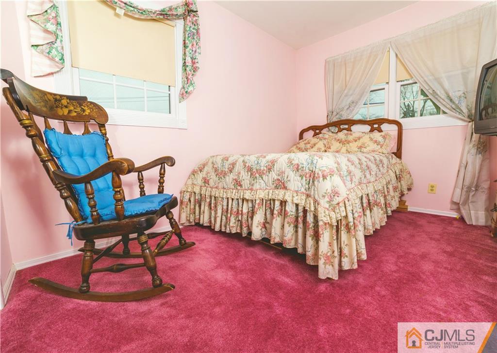 110 Princeton Road Old Bridge, NJ 08859 - Photo 14 of 19 a bedroom with furniture and a window