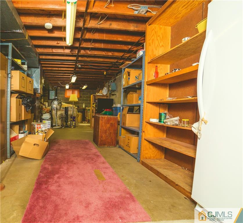 110 Princeton Road Old Bridge, NJ 08859 - Photo 18 of 19 a view of an empty room and kitchen