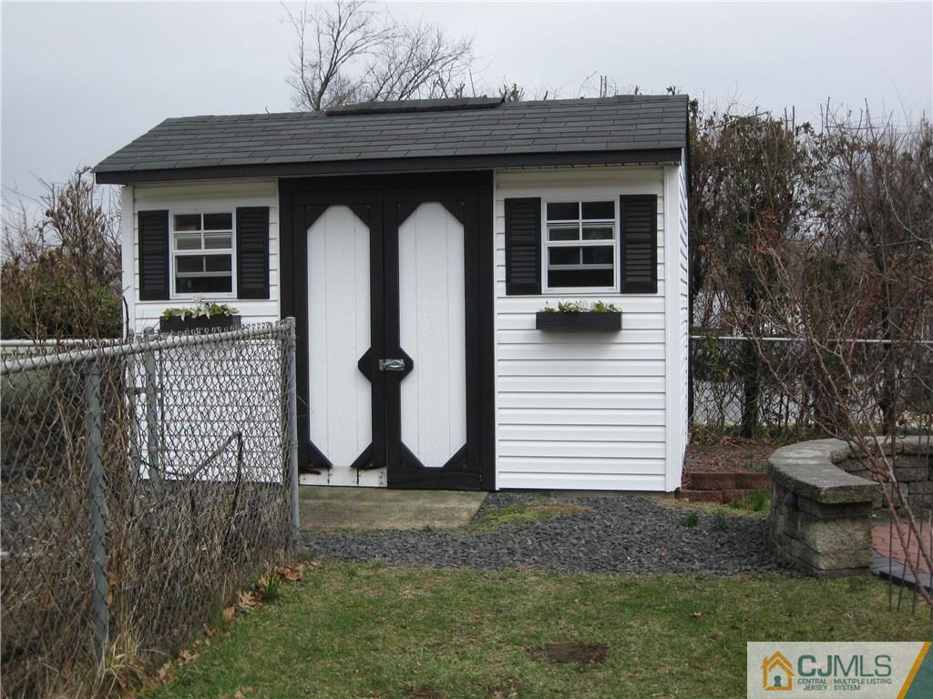 110 Princeton Road Old Bridge, NJ 08859 - Photo 4 of 19 a front view of a house with garden