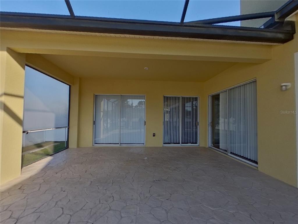 Undisclosed Address Land O Lakes, FL 34638 - Photo 17 of 18 a view of a room with an empty space