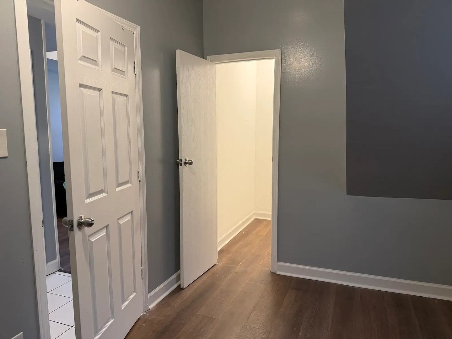 3033 South Kenneth Avenue Chicago, IL 60623 - Photo 17 of 43 a view of a hallway with wooden floor