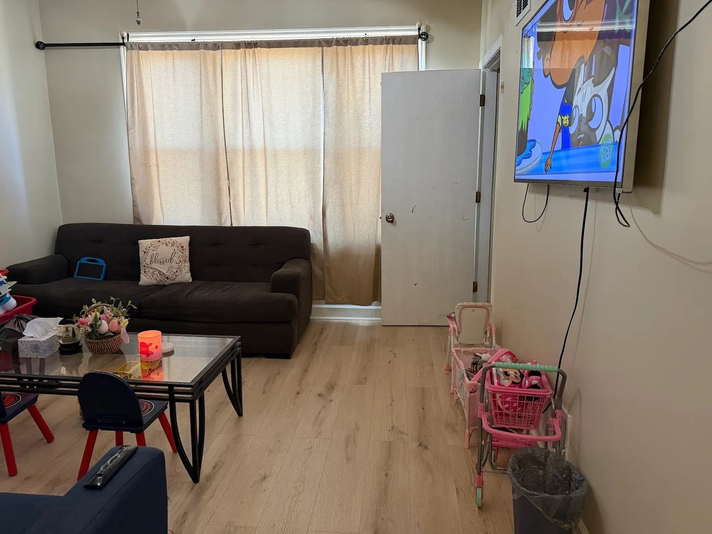 3033 South Kenneth Avenue Chicago, IL 60623 - Photo 22 of 43 a living room with furniture and a window