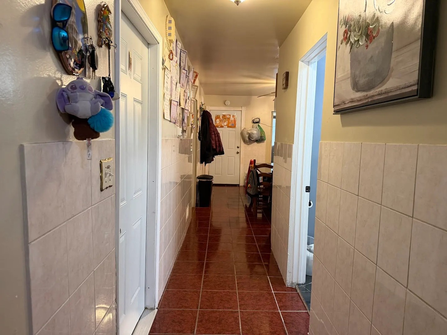 3033 South Kenneth Avenue Chicago, IL 60623 - Photo 24 of 43 a view of a hallway with wooden floor and staircase