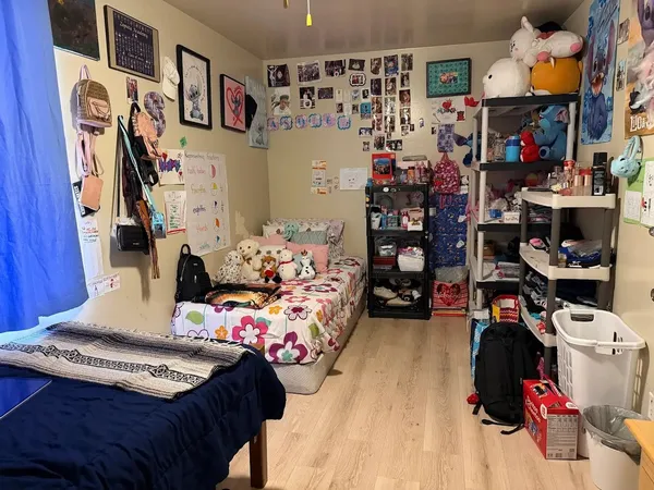 a bed room with a bed and a store
