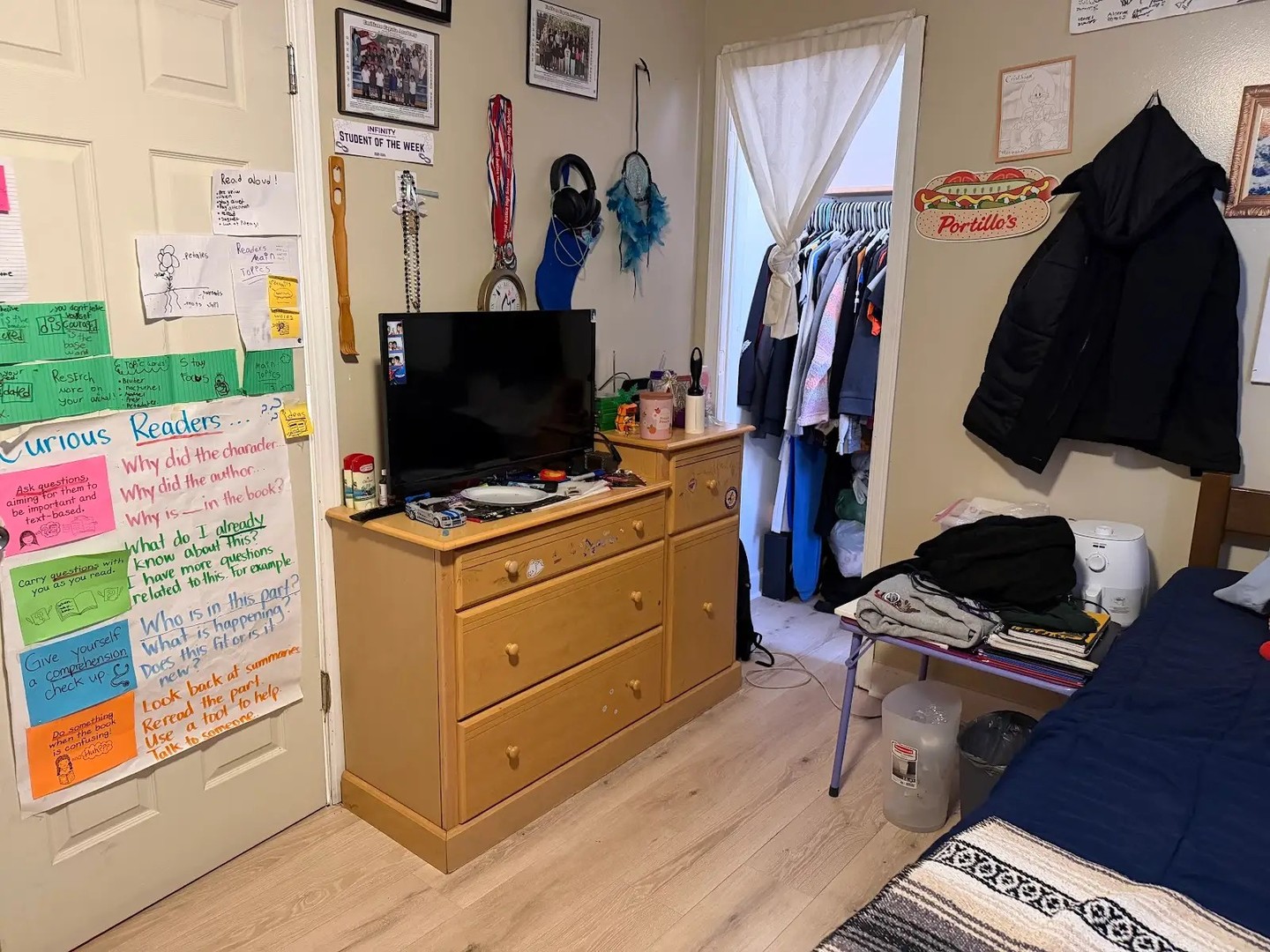 3033 South Kenneth Avenue Chicago, IL 60623 - Photo 29 of 43 a living room with furniture and a flat screen tv