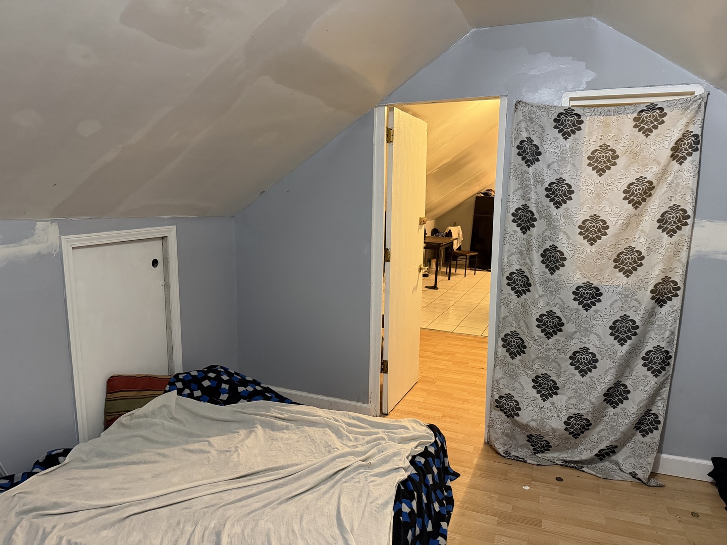 3033 South Kenneth Avenue Chicago, IL 60623 - Photo 40 of 43 a bedroom with a bed and a window