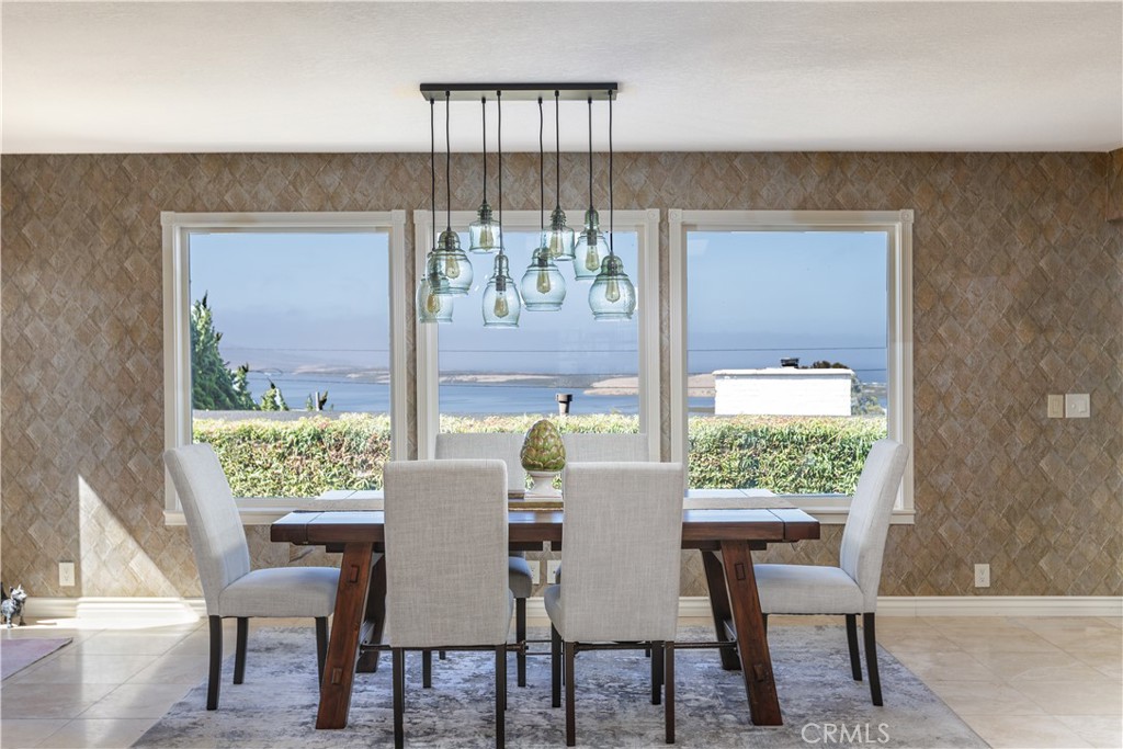 710 Ridgeway Street Morro Bay, CA 93442 - Photo 1 of 1 a view of a dining room with furniture window and outside view