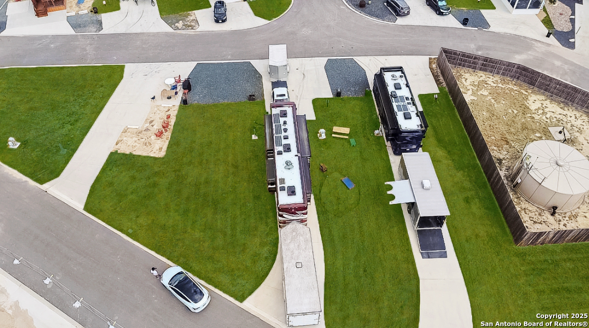 5386 Ranch Road 1376, Unit 232 Fredericksburg, TX 78624 - Photo 2 of 13 an aerial view of a chairs and table on the wall