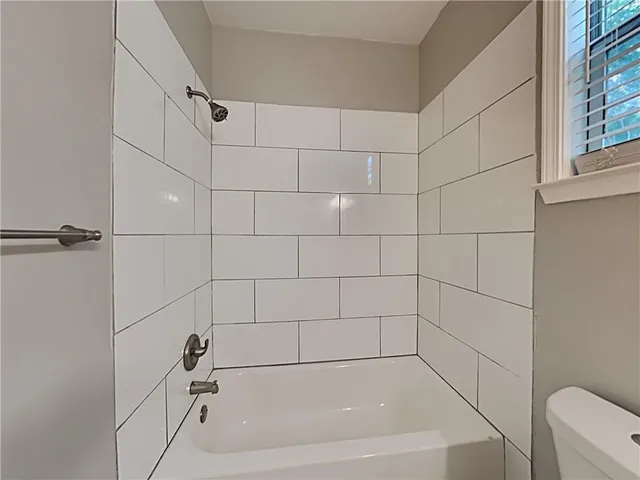 a bathroom with a bathtub