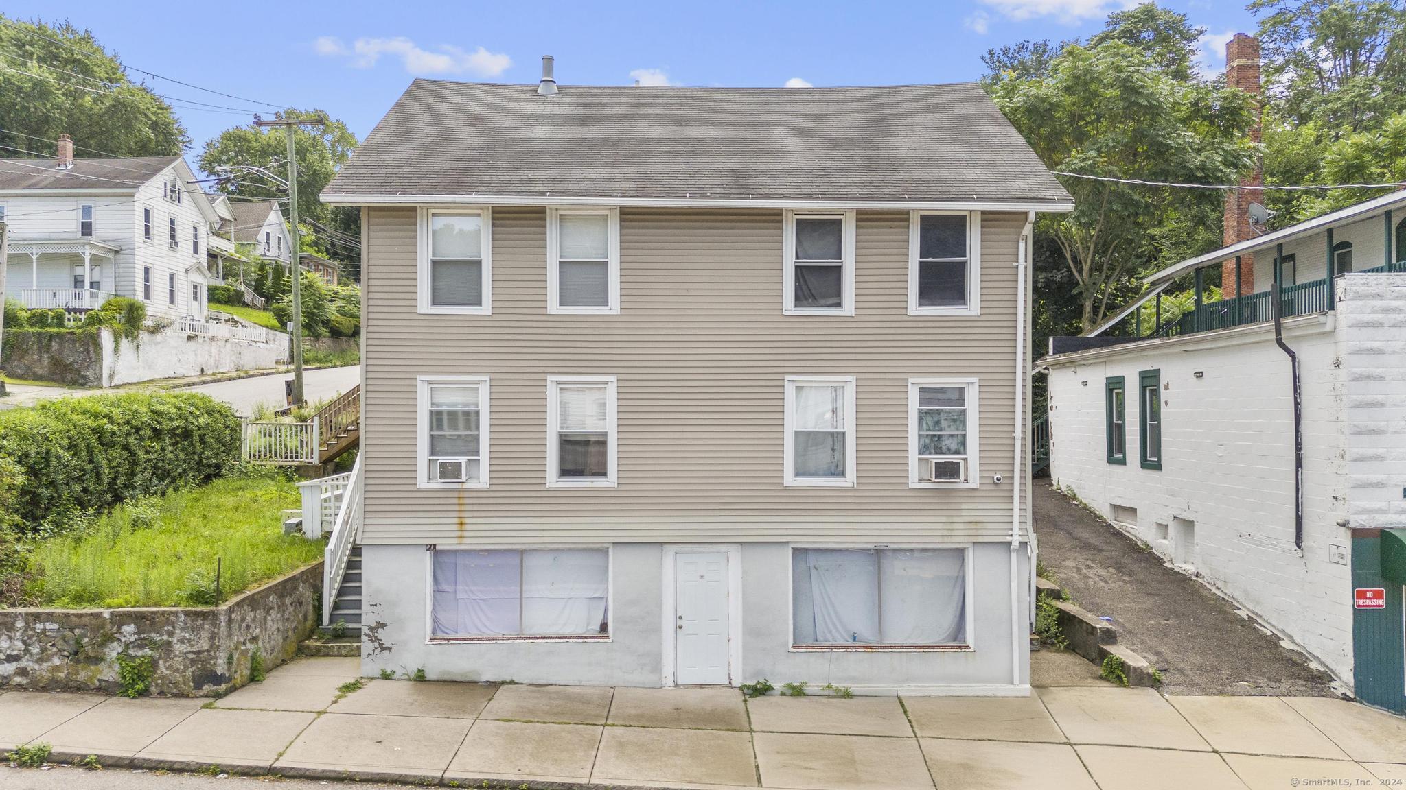 201 Franklin Street Norwich, CT 06360 - Photo 1 of 1 a front view of a house with a garden