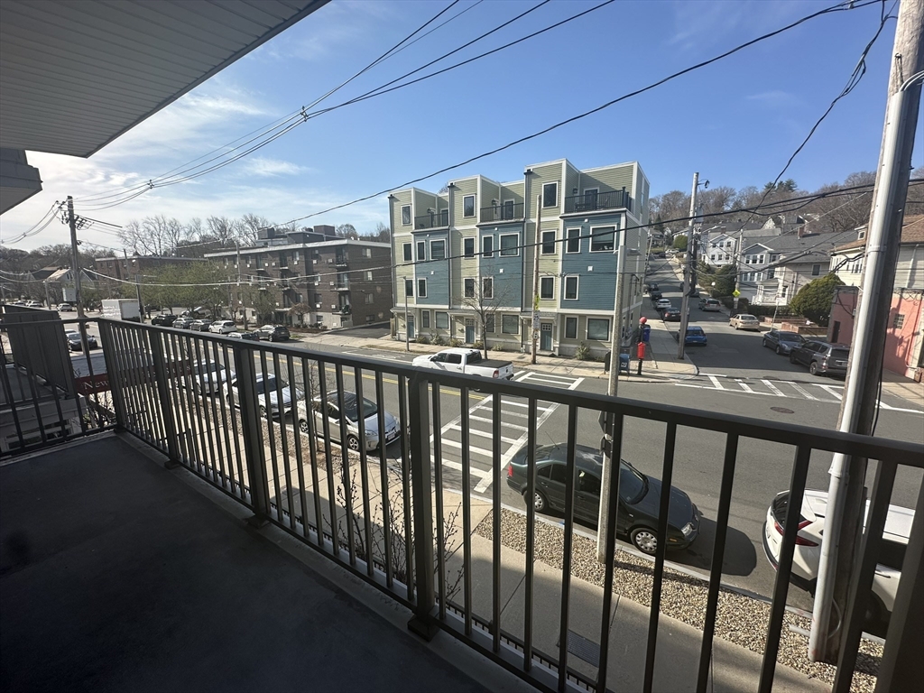 121 Tremont Street, Unit 114 Boston, MA 02135 - Photo 13 of 13 a view of city from a balcony