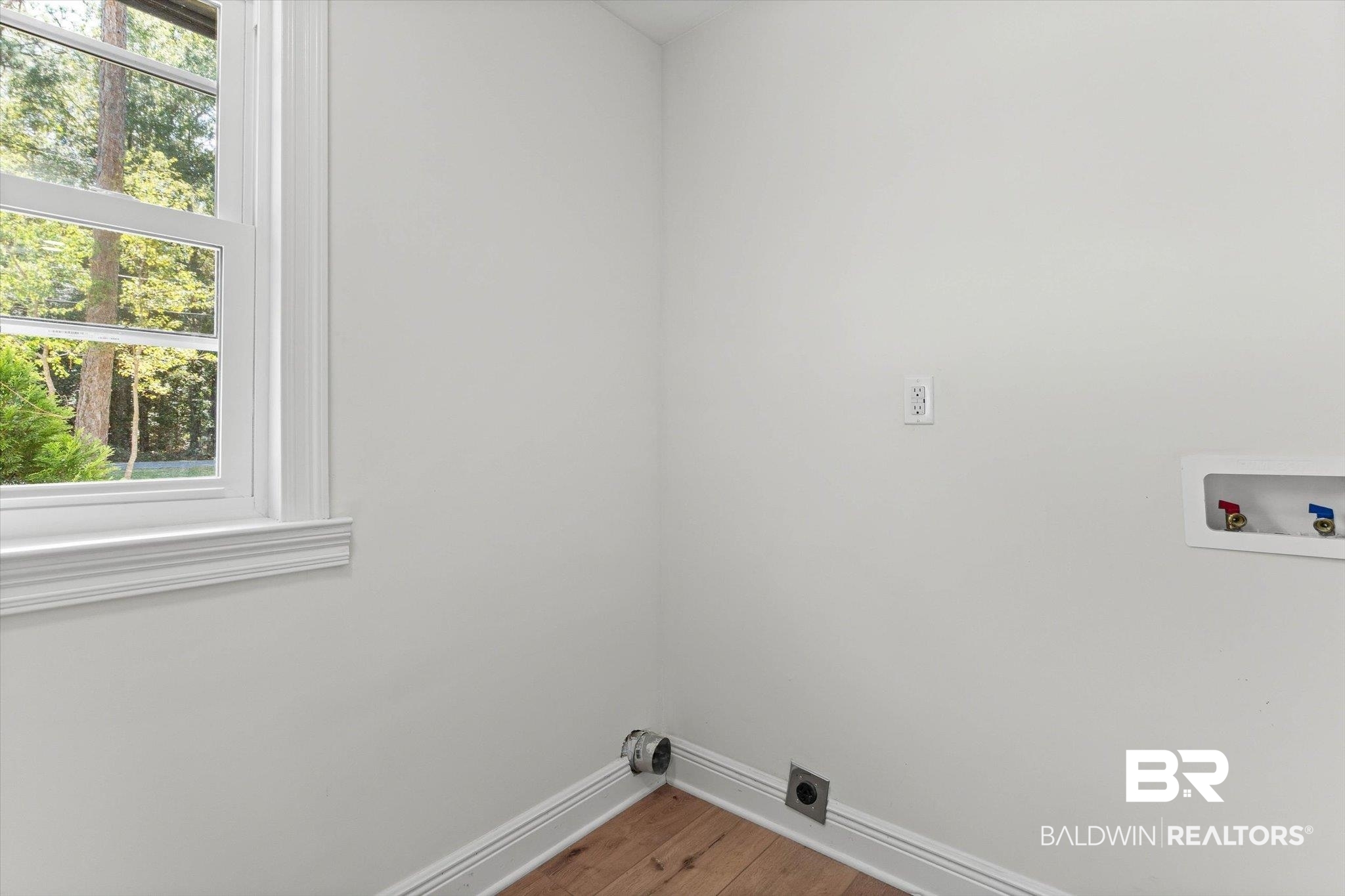 4156 Furman Drive Mobile, AL 36619 - Photo 18 of 24 Washroom with light wood-style flooring and washer hookup