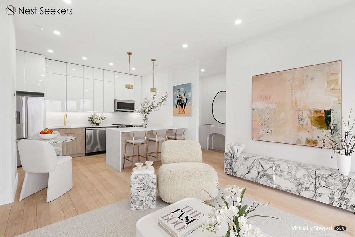 45-29 47th Street, Unit 5B Queens, NY 11377 - Photo 3 of 11 a living room with furniture a table and kitchen view