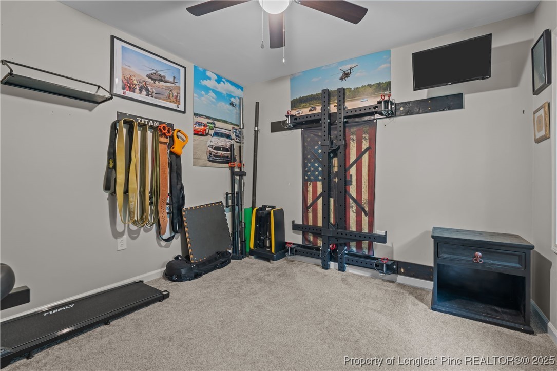 76 North Hillside Drive Spring Lake, NC 28390 - Photo 28 of 50 a view of walk in closet with a mirror