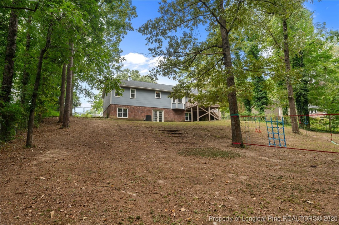 76 North Hillside Drive Spring Lake, NC 28390 - Photo 47 of 50 a view of a house with a tree in front of it