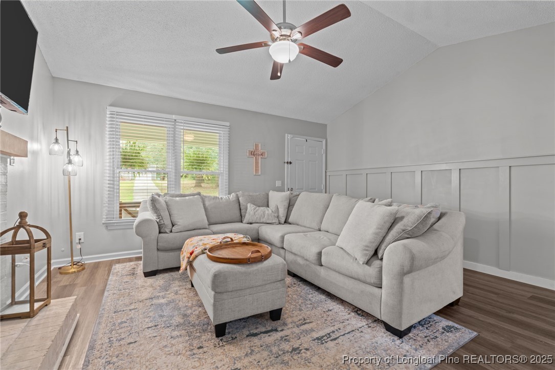 76 North Hillside Drive Spring Lake, NC 28390 - Photo 8 of 50 a living room with furniture and a large window