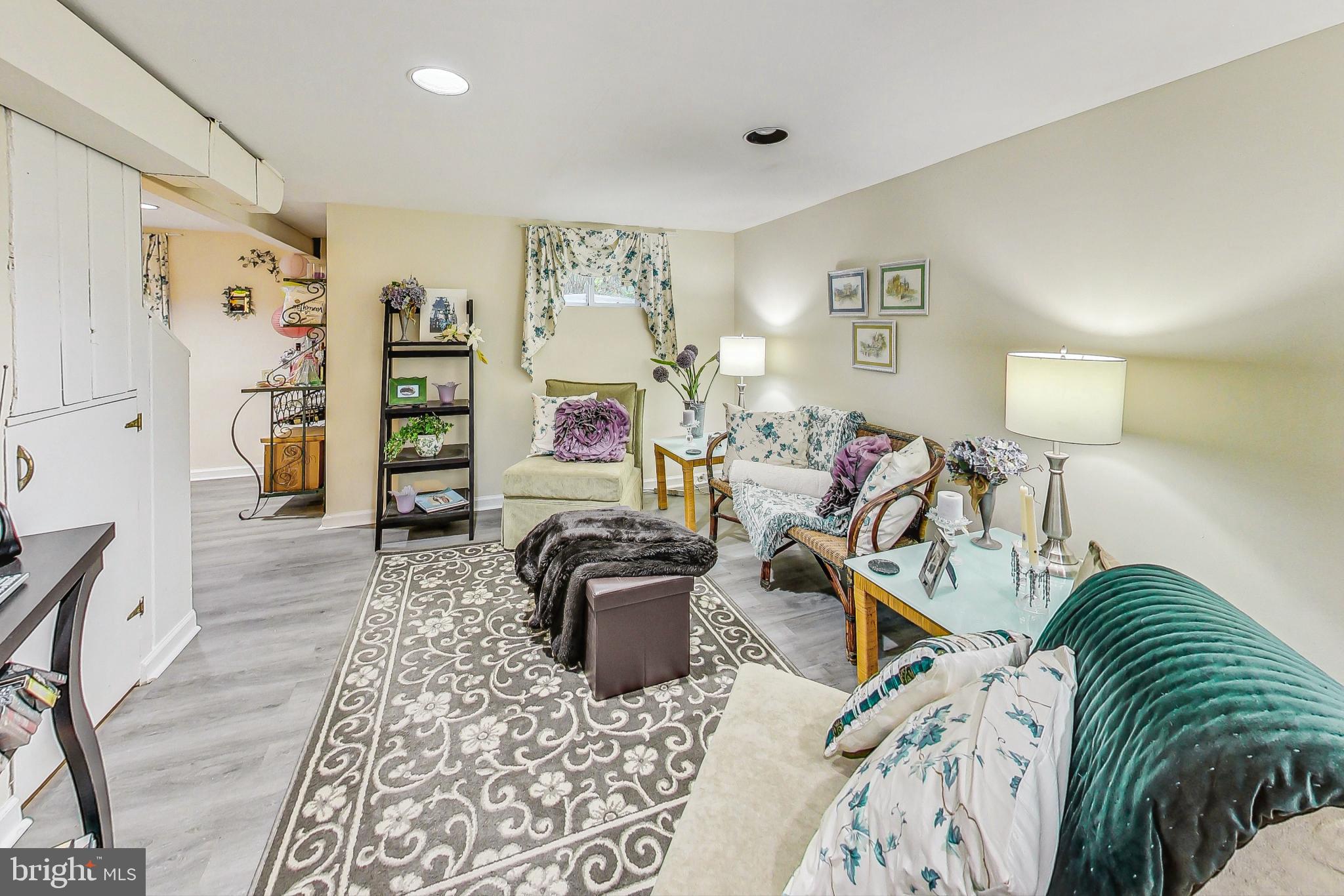 10404 Grandin Road Silver Spring, MD 20902 - Photo 21 of 38 a living room with furniture and a flat screen tv