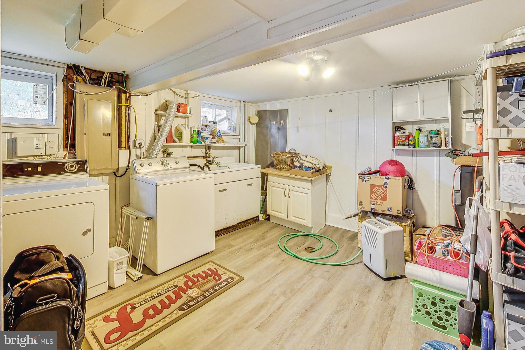 10404 Grandin Road Silver Spring, MD 20902 - Photo 26 of 38 a view of a kitchen with fridge and workspace