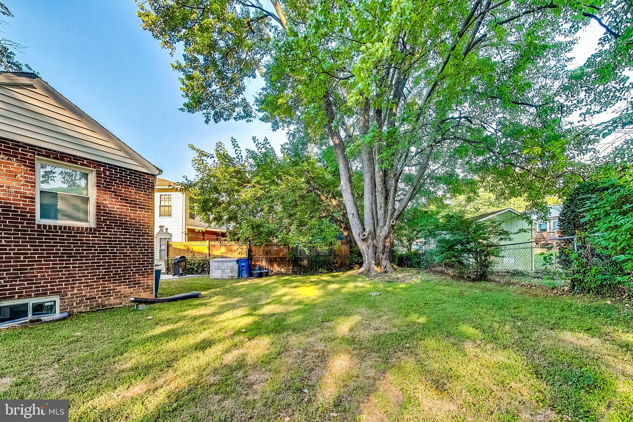 10404 Grandin Road Silver Spring, MD 20902 - Photo 33 of 38 a view of a trees in front of a house