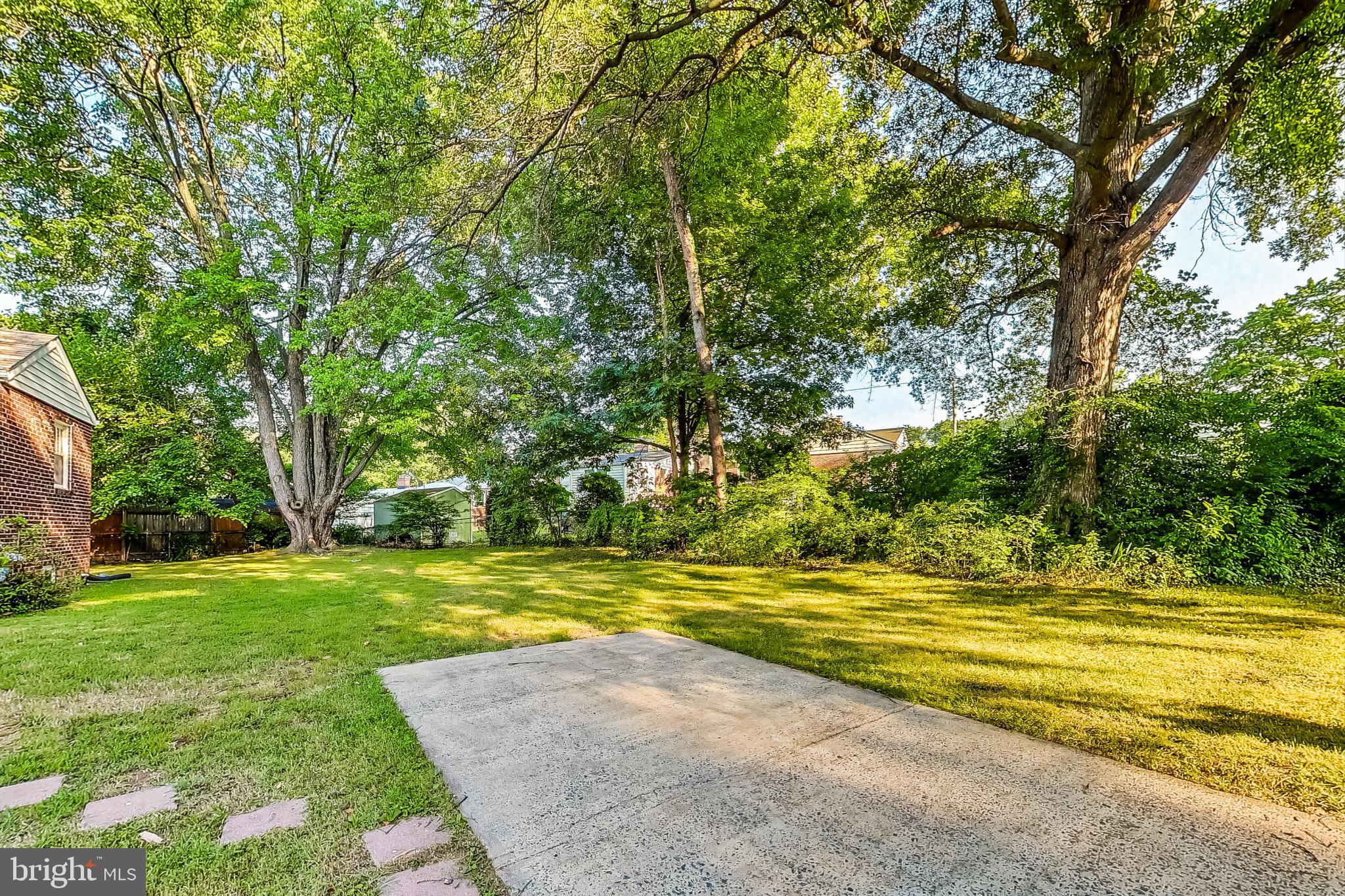 10404 Grandin Road Silver Spring, MD 20902 - Photo 34 of 38 a view of a yard with a trees
