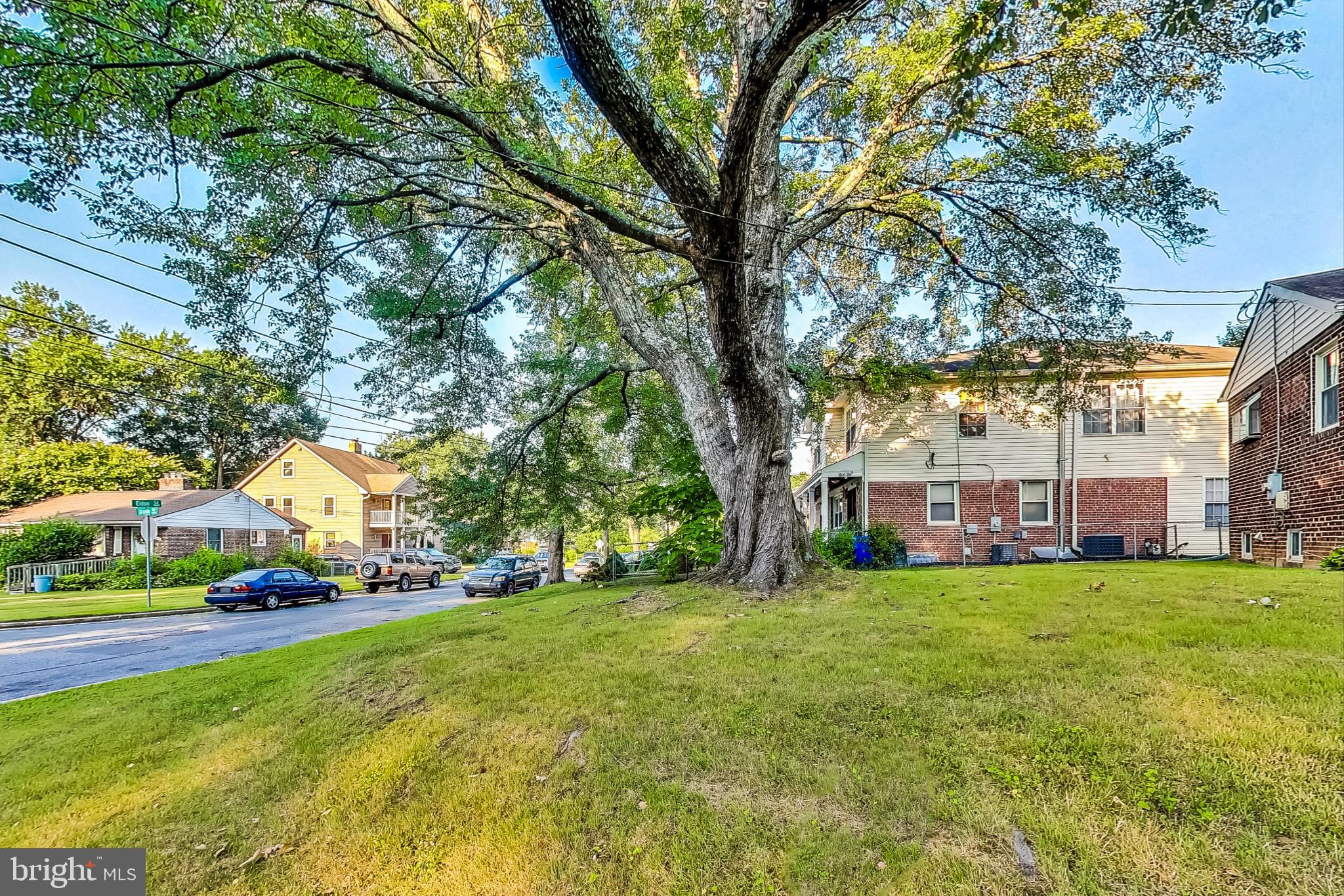 10404 Grandin Road Silver Spring, MD 20902 - Photo 35 of 38 a view of a yard with a house and large trees