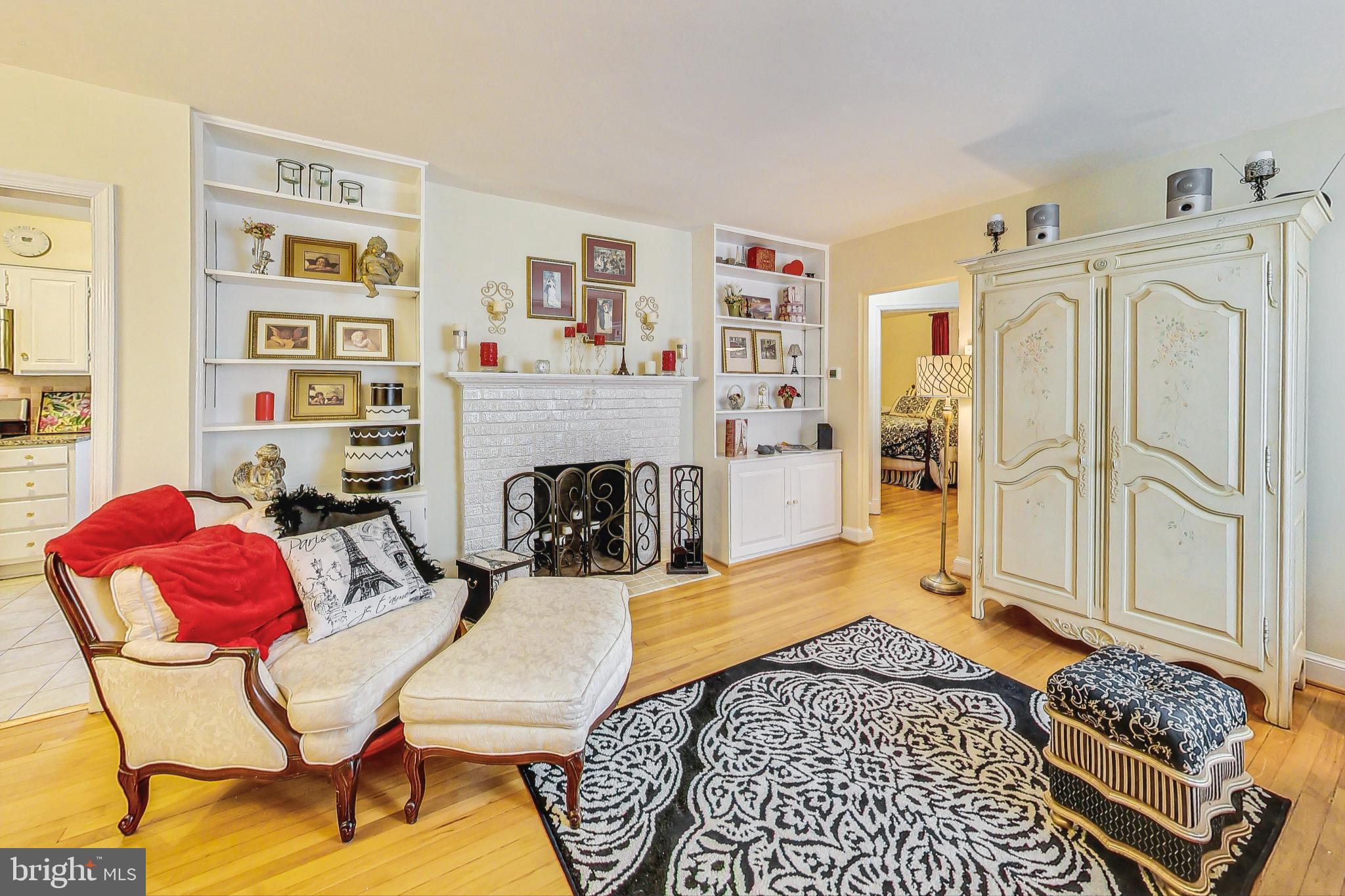 10404 Grandin Road Silver Spring, MD 20902 - Photo 4 of 38 a living room with furniture and a fireplace
