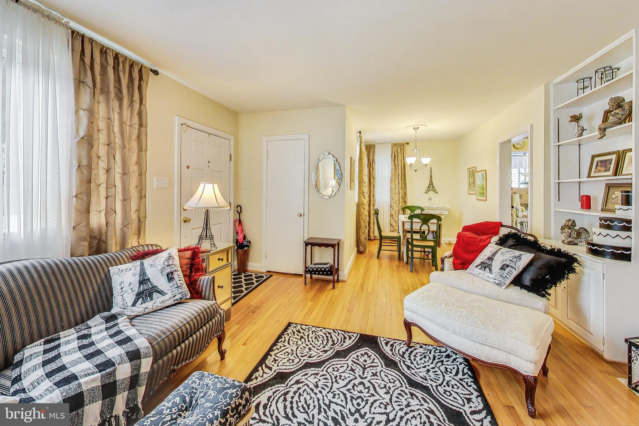 10404 Grandin Road Silver Spring, MD 20902 - Photo 6 of 38 a living room with furniture and a couch