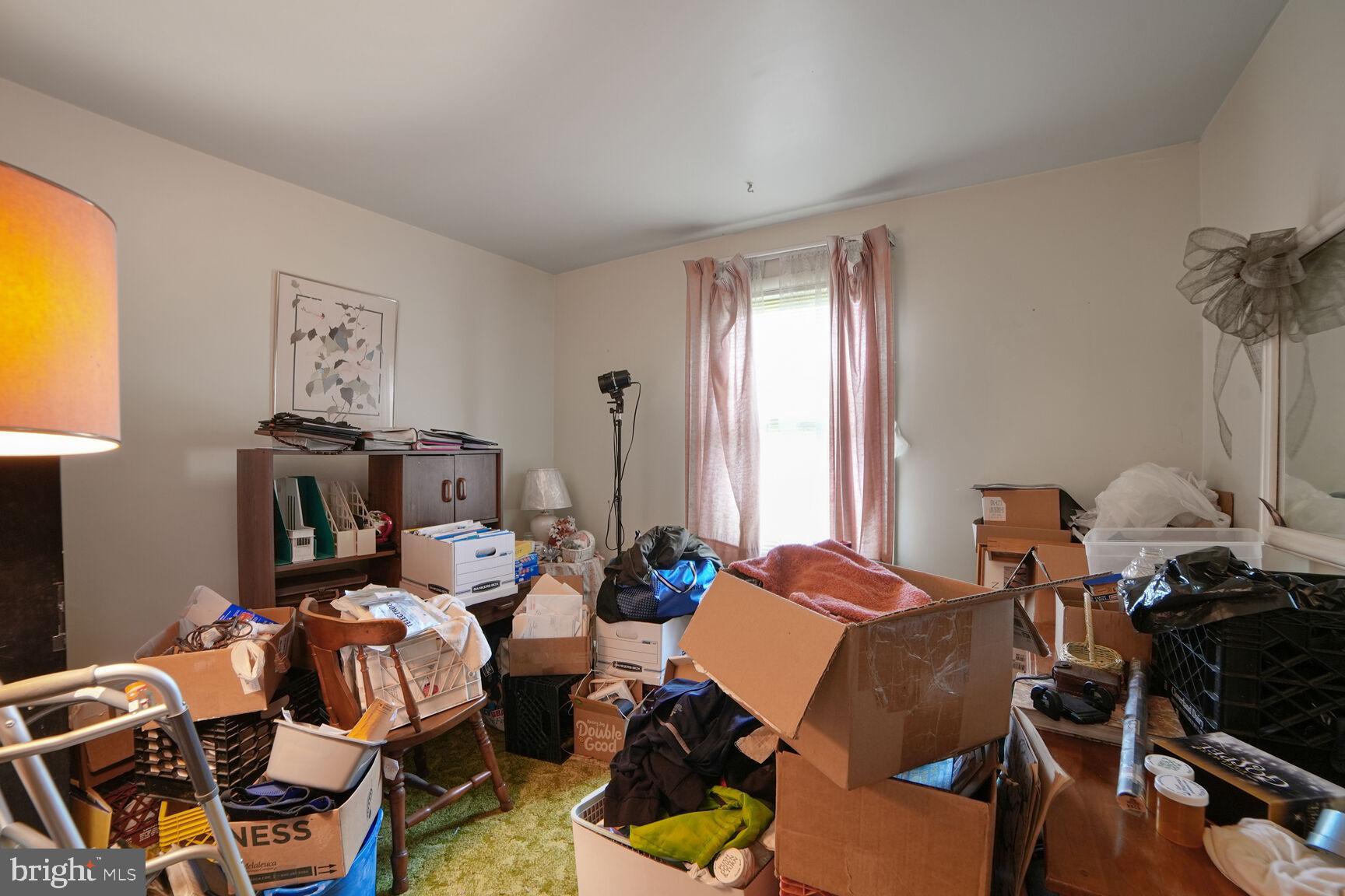 3263 Hawks Hill Road New Windsor, MD 21776 - Photo 14 of 19 a living room with furniture a window and a lamp