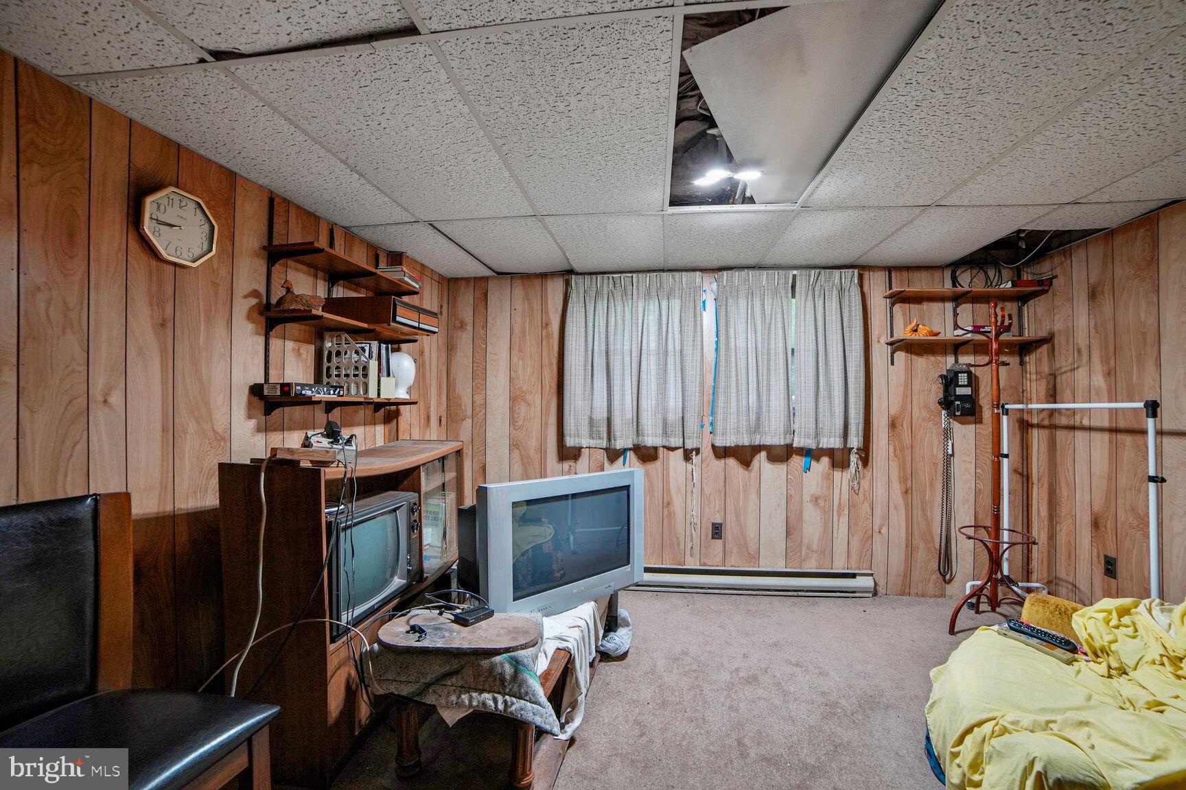 3263 Hawks Hill Road New Windsor, MD 21776 - Photo 15 of 19 a view of a livingroom with furniture and a fireplace