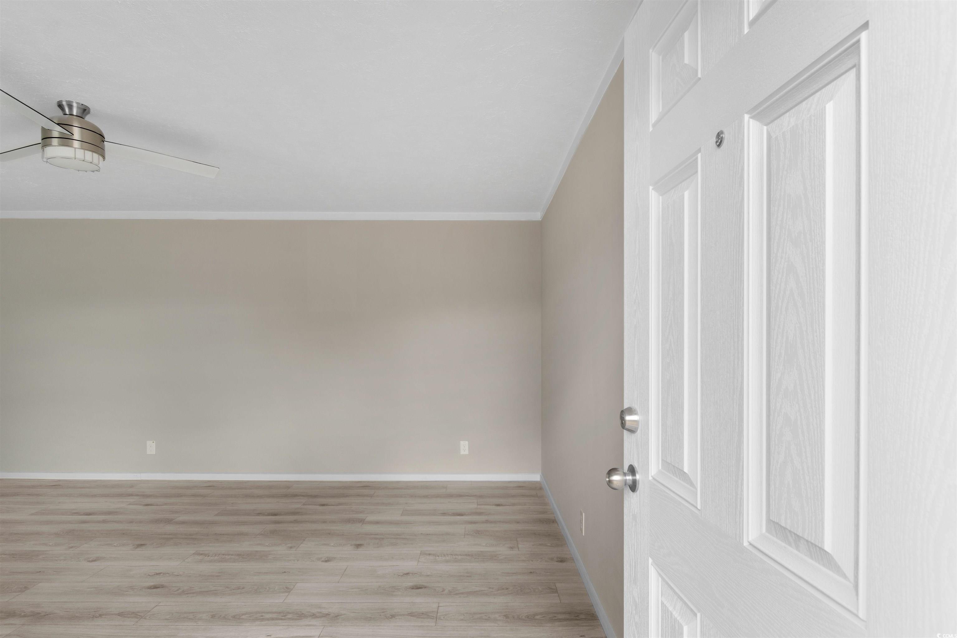 121 Feather Drive Georgetown, SC 29440 - Photo 9 of 40 Additional living space featuring light wood-style flooring and baseboards