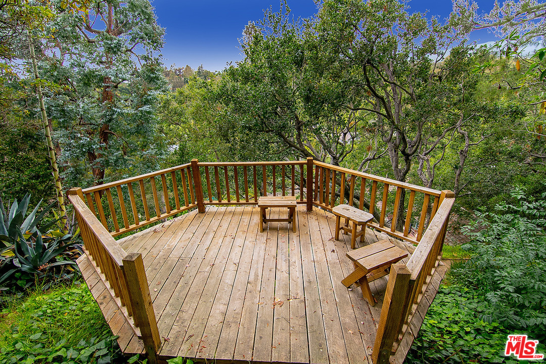 37 Haldeman Road Santa Monica, CA 90402 - Photo 22 of 23 a view of balcony with wooden floor and outdoor seating