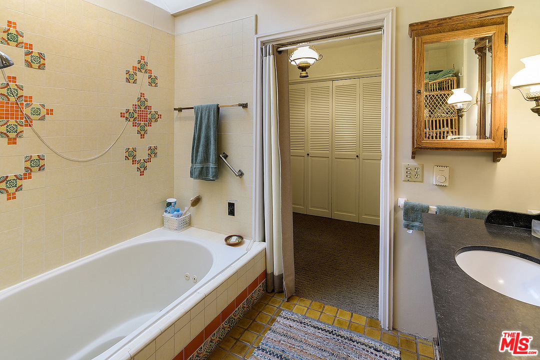 37 Haldeman Road Santa Monica, CA 90402 - Photo 9 of 23 a bathroom with a tub and a shower