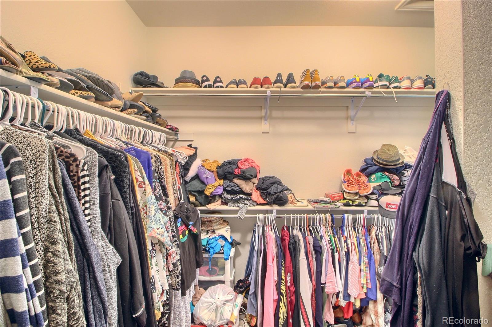 1335 South Chambers Road, Unit 101 Aurora, CO 80017 - Photo 32 of 40 a view of a walk in closet