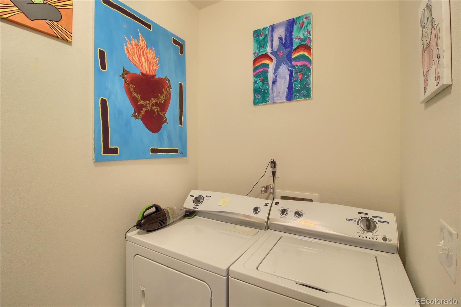 1335 South Chambers Road, Unit 101 Aurora, CO 80017 - Photo 36 of 40 a bathroom with a sink and a mirror