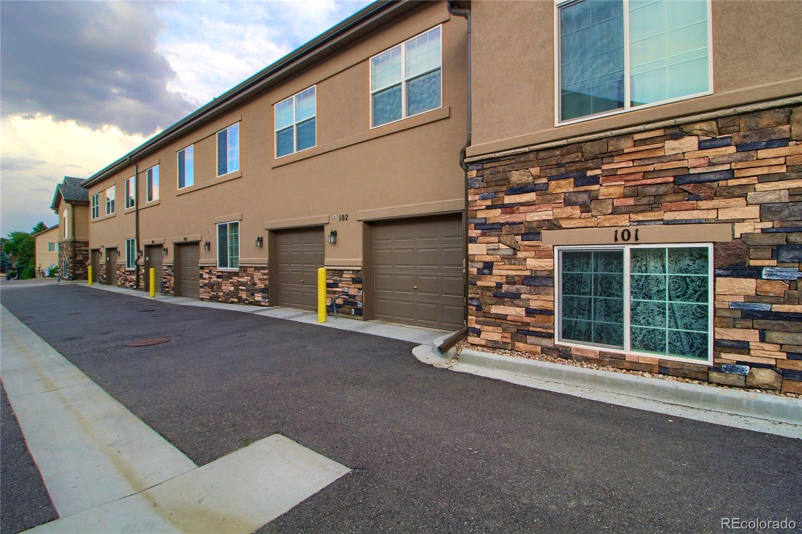1335 South Chambers Road, Unit 101 Aurora, CO 80017 - Photo 37 of 40 a view of a building with a street