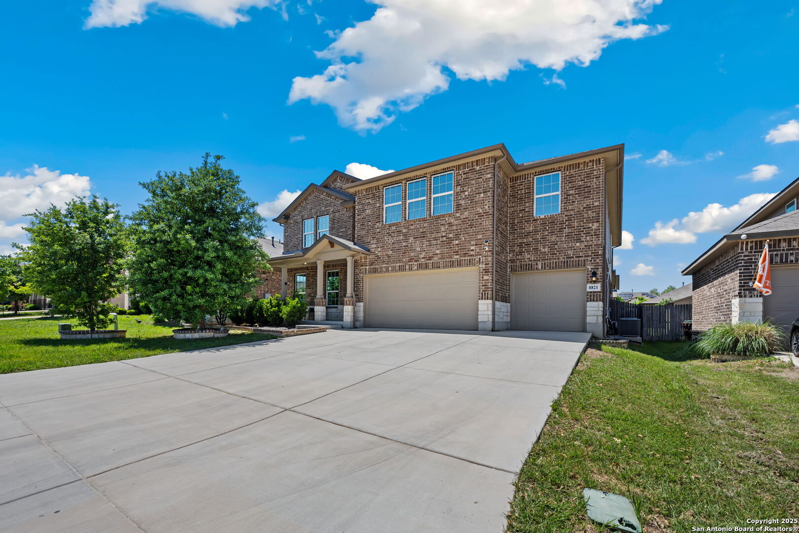 8821 Chavez Path San Antonio, TX 78254 - Photo 1 of 1 a front view of a house with a yard and garage