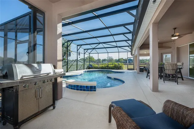 a kitchen with stainless steel appliances granite countertop a sink and a cabinets