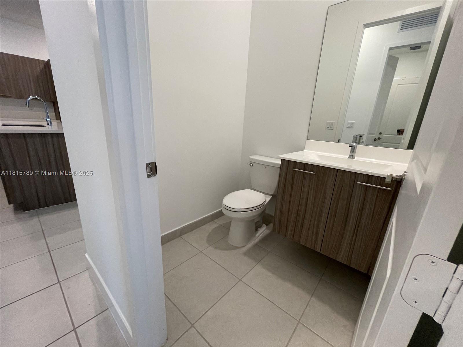 4506 Southwest 174th Avenue, Unit 4506 Miramar, FL 33029 - Photo 36 of 80 a bathroom with a sink and a toilet
