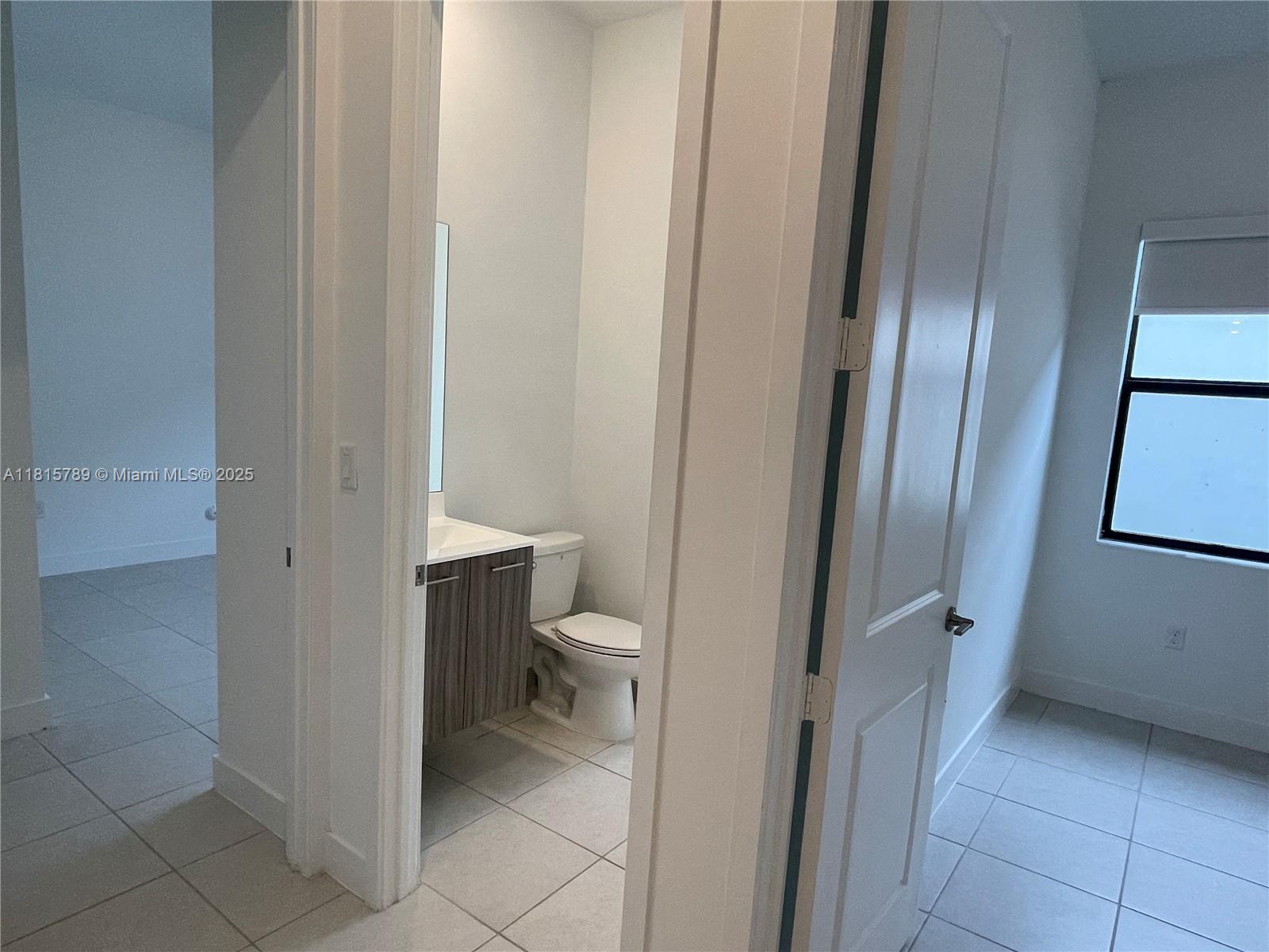 4506 Southwest 174th Avenue, Unit 4506 Miramar, FL 33029 - Photo 42 of 80 a bathroom with a toilet