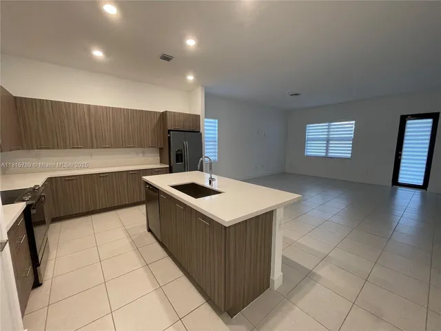 a white bath tub sitting in a bathroom