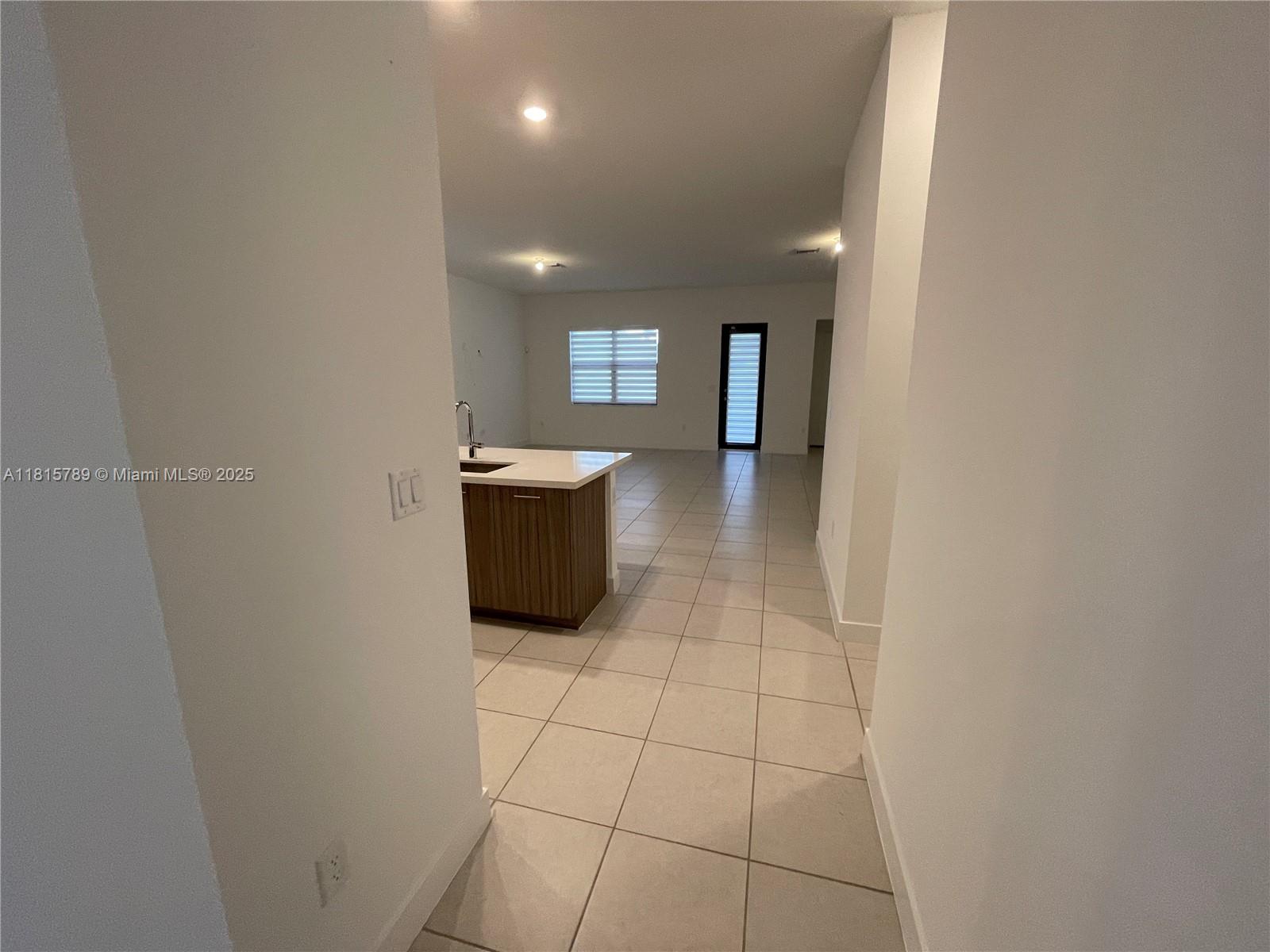 4506 Southwest 174th Avenue, Unit 4506 Miramar, FL 33029 - Photo 51 of 80 a view of an empty room and window