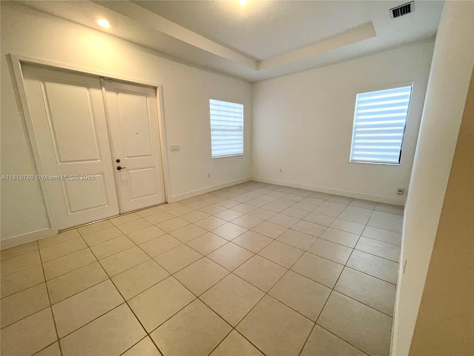 4506 Southwest 174th Avenue, Unit 4506 Miramar, FL 33029 - Photo 64 of 80 a view of an empty room and a window