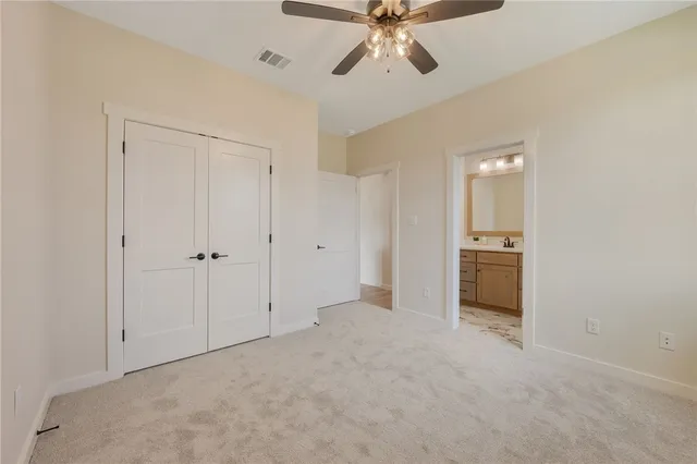 a view of a kitchen with a sink and dishwasher