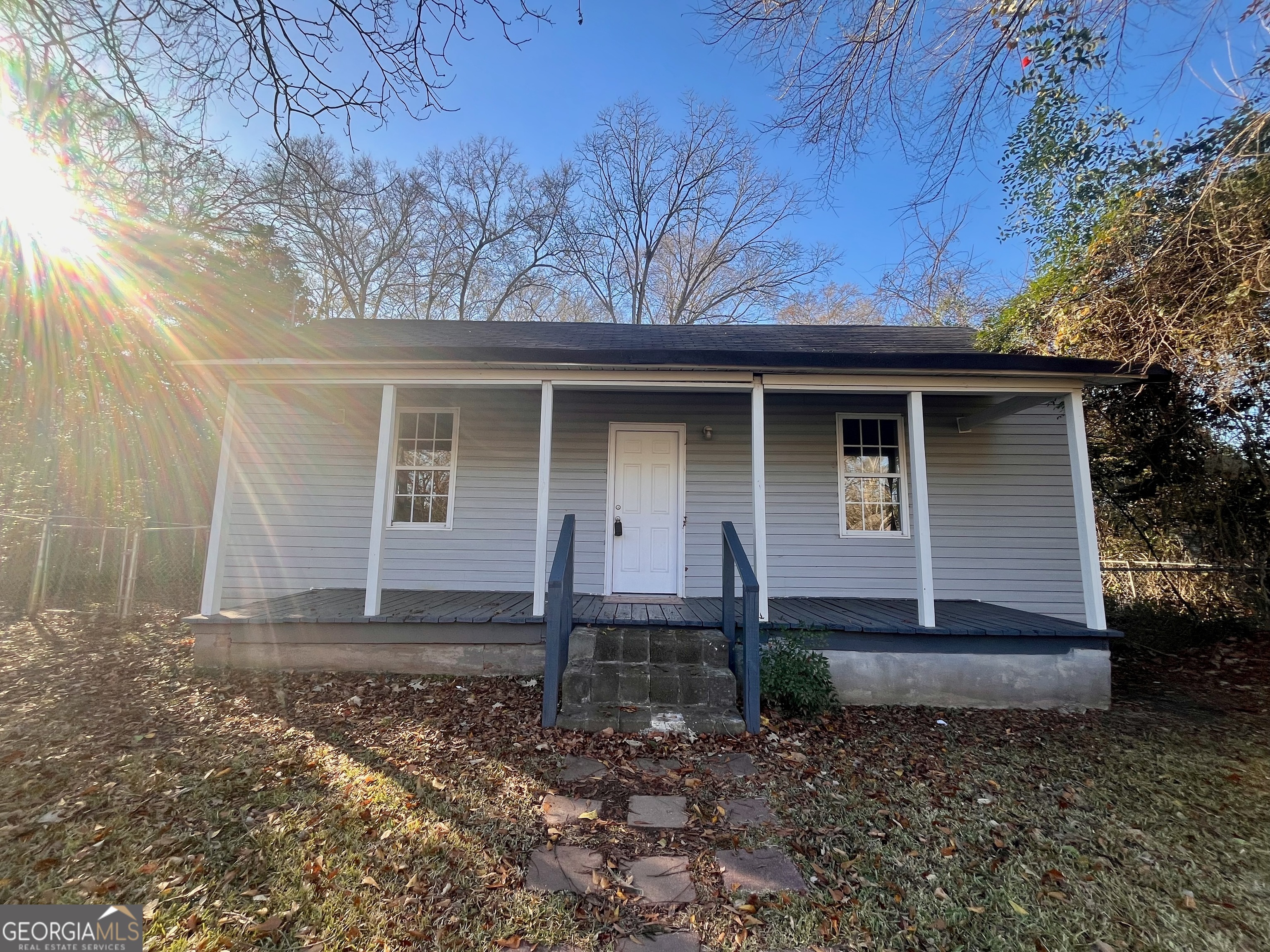 a house view with a backyard space
